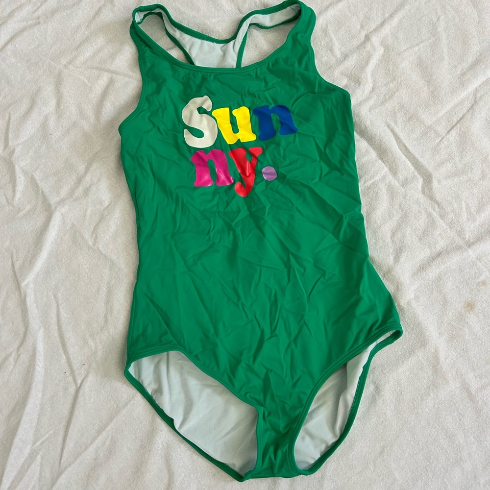 Boden teen bathing suit. Says “Sunny”.